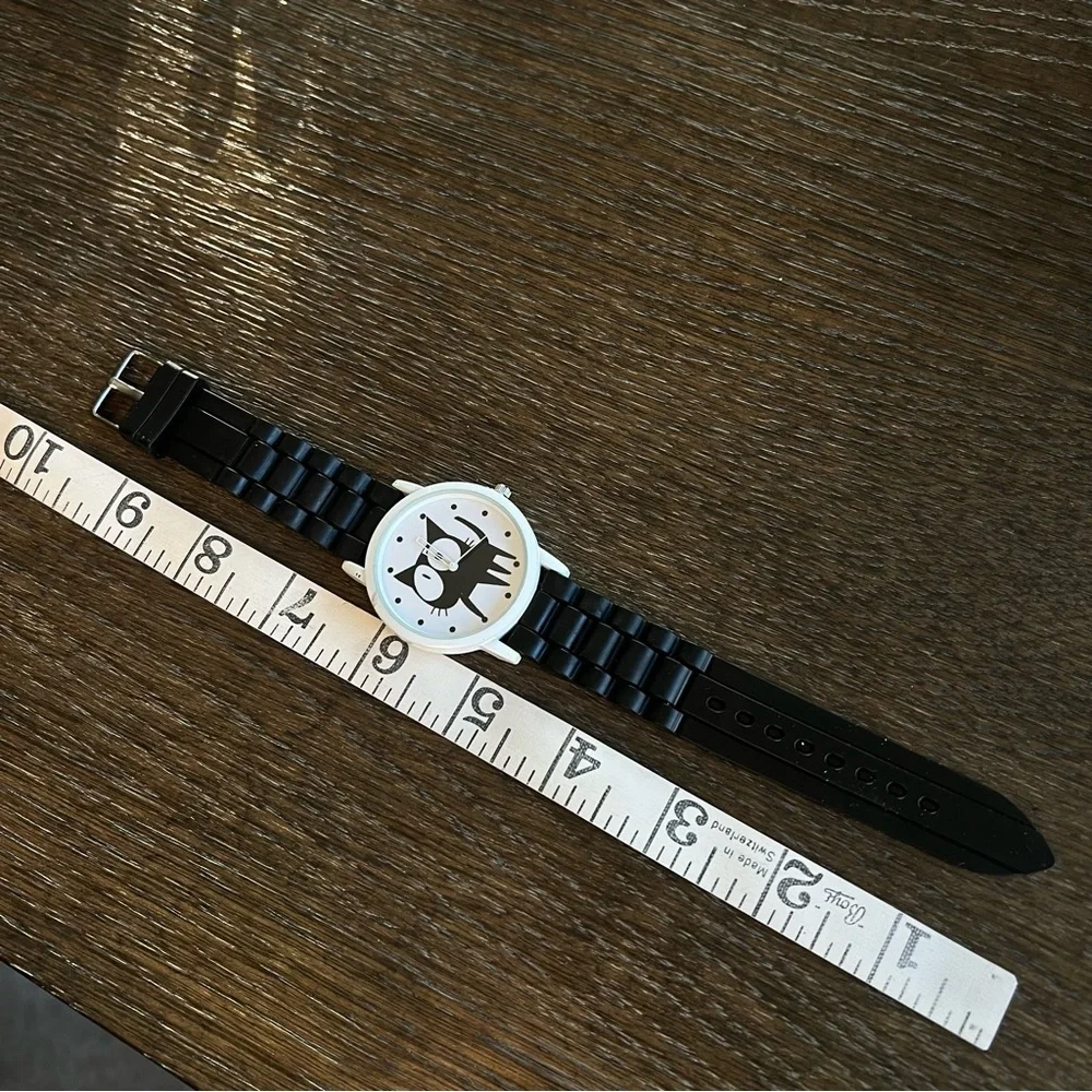 Cat watch, rubber black watch band. Gently used